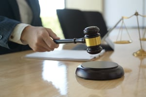 concept-of-justice-lawyer-holding-a-hammer-preten-2021-08-26-17-53-54-utc